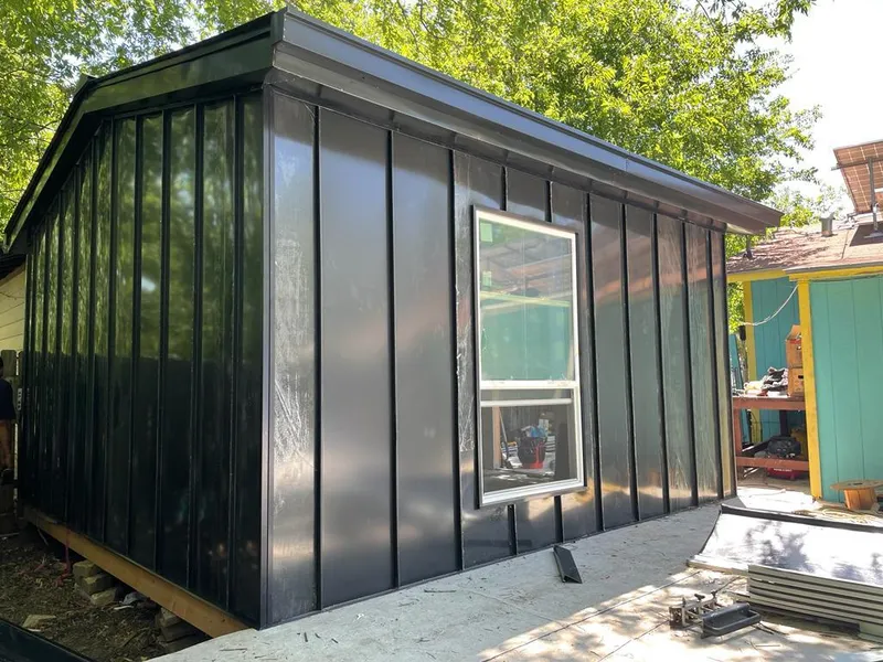 Black standing seam metal wall panels for Metal Roof Installation in Cortland