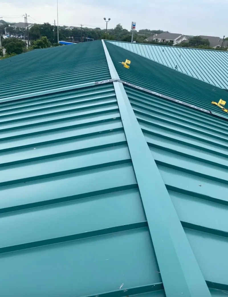 Green commercial metal roof ridge and valley for Metal Roof Repair in Cortland